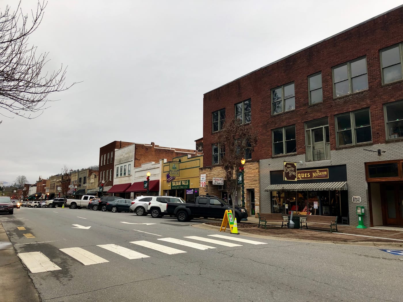 A row of small storefronts along a quiet main street.